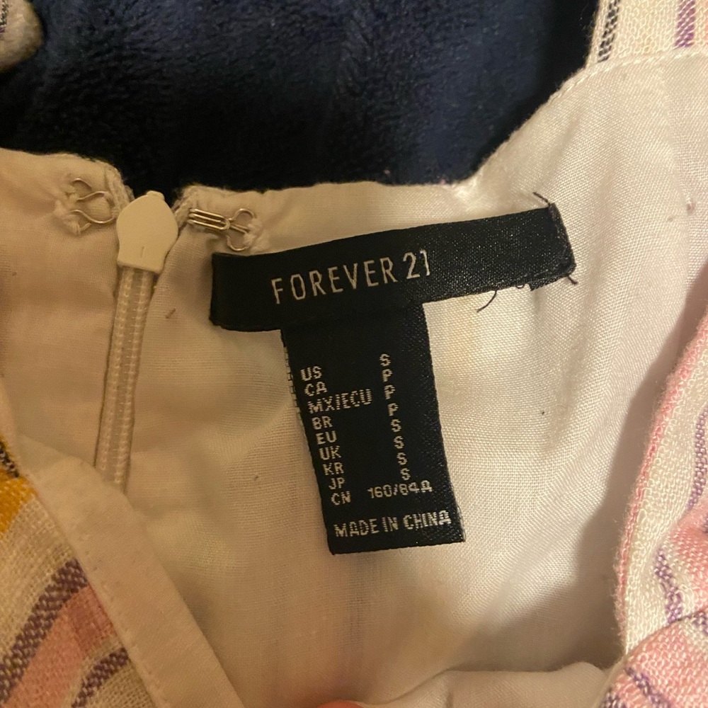 Small form fitting Forever 21 White, yellow, pink, and purple dress